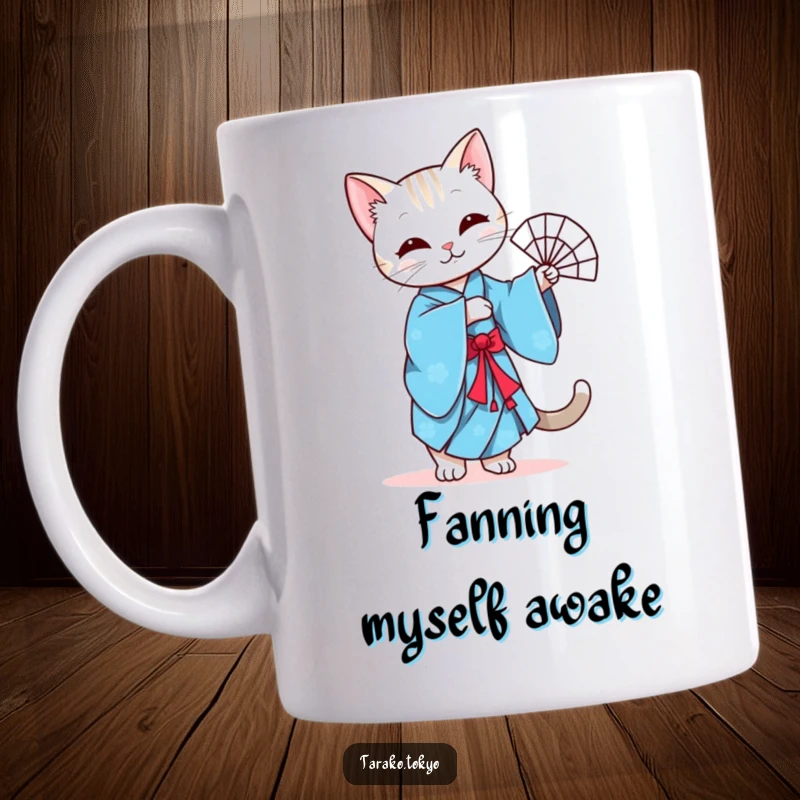 Funny mug featuring a graceful cat in a vibrant blue kimono performing a gentle fan dance with poise and charm.