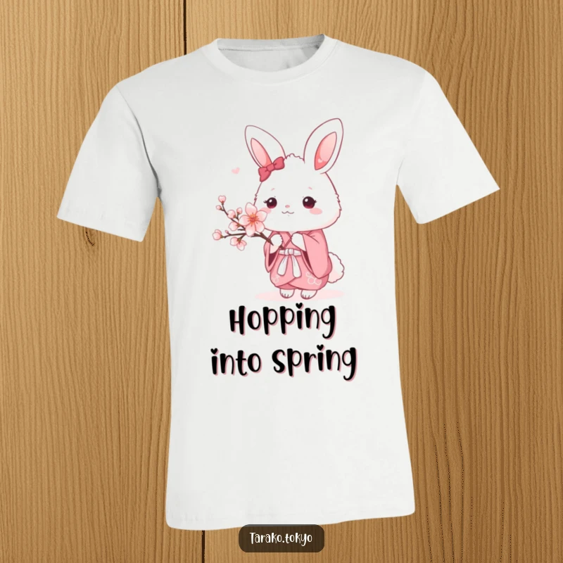 Funny T-Shirt with a fluffy bunny character dressed in a pink kimono, holding a delicate cherry blossom branch, radiating cuteness.
