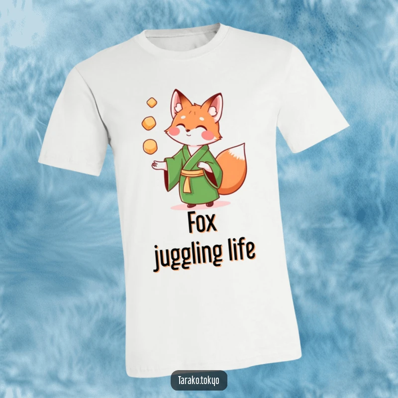 Funny T-Shirt with a playful fox in a green kimono juggling colorful mochi, vibrant and full of action.